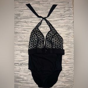 Venus batting-suit never worn.